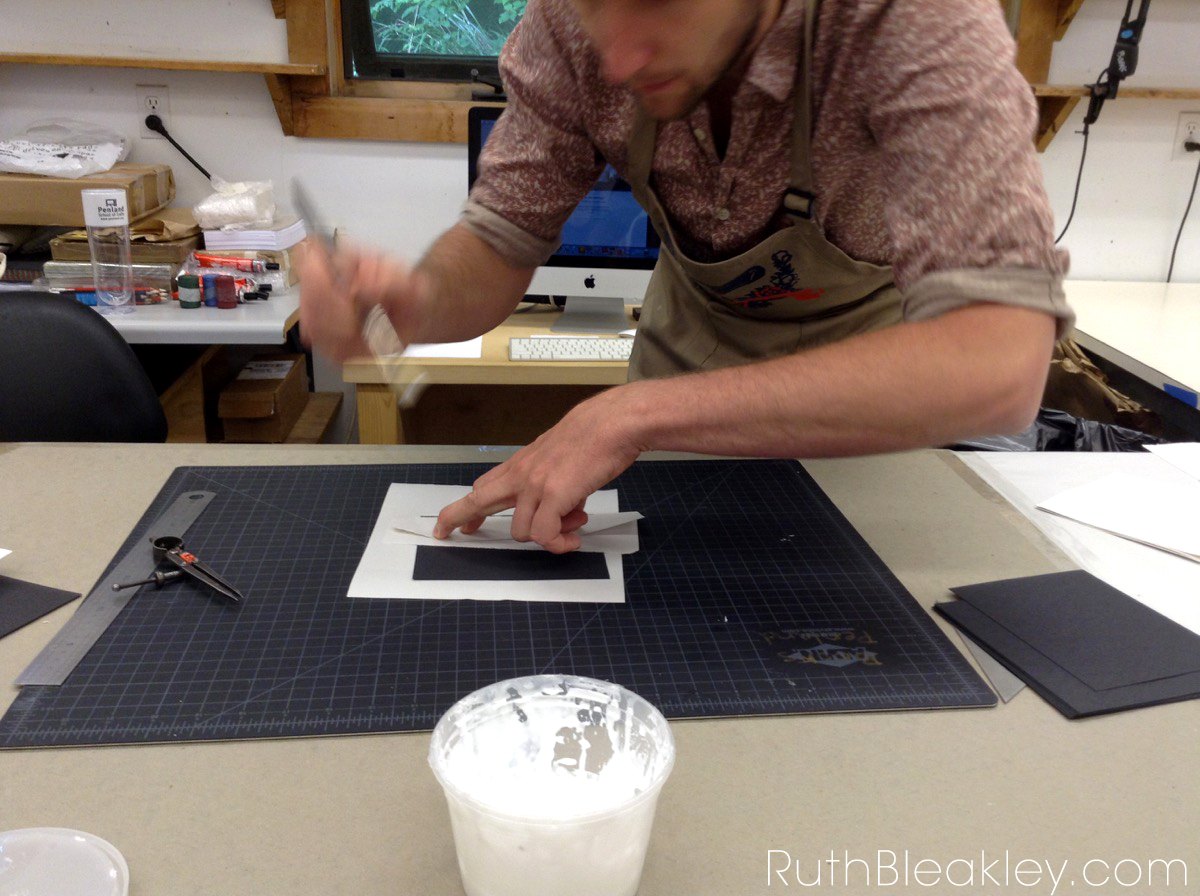 Benjamin Elbel demonstrating onionskin binding at Penland