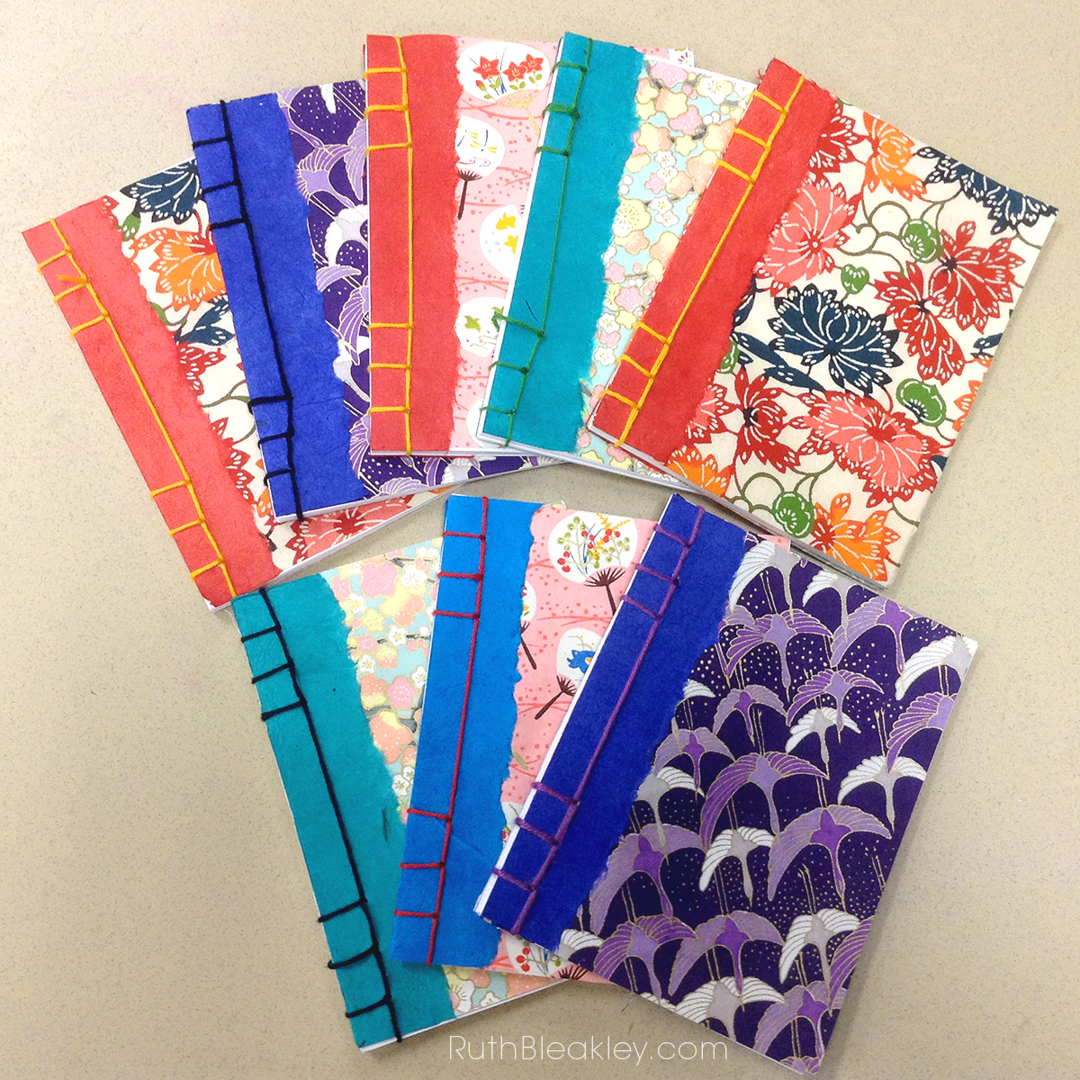 Chiyogami Japanese Stab Binding Notebooks made by a class taught by Ruth Bleakley in Florida