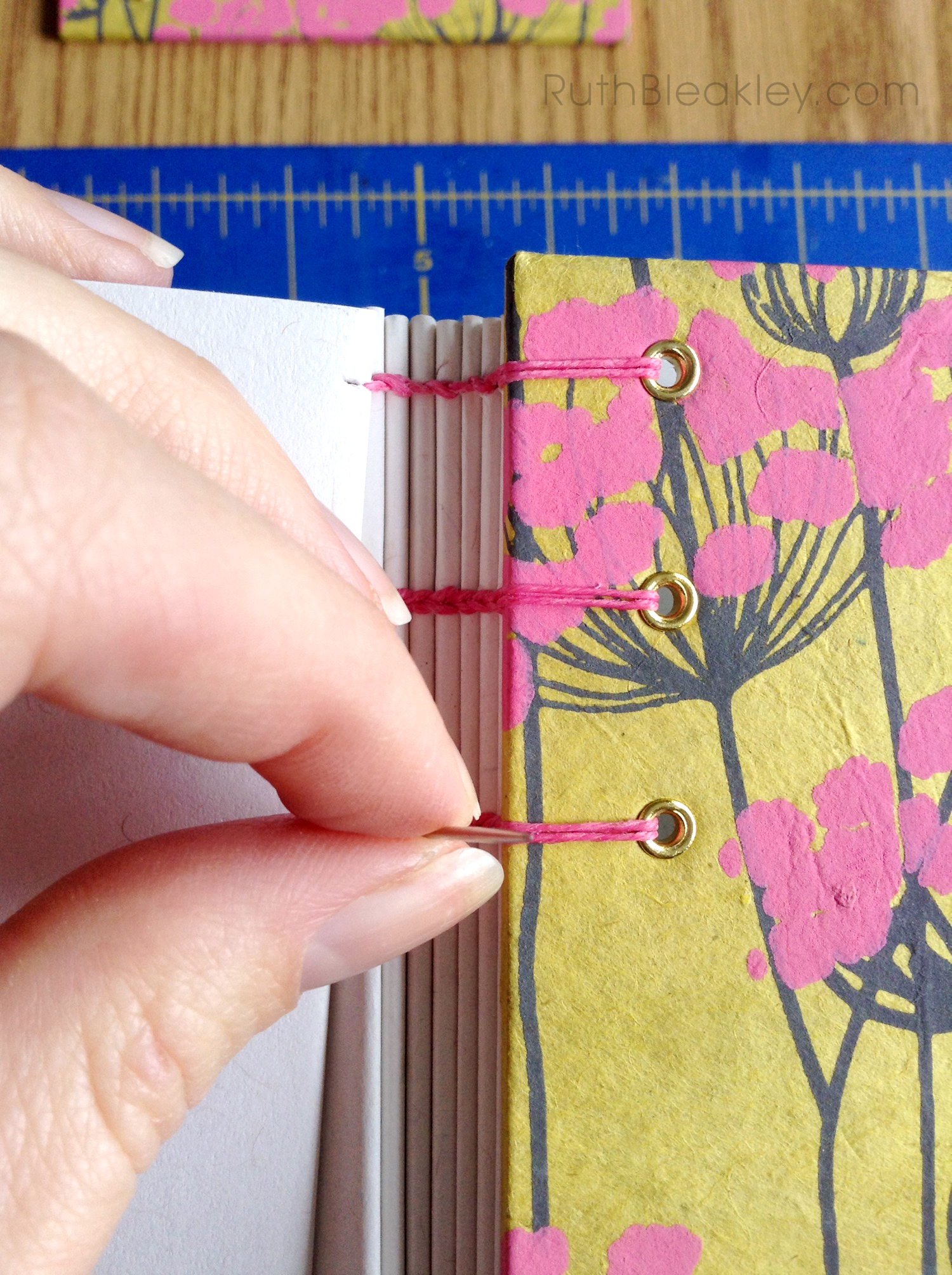 Coptic Stitch Journal handmade by Ruth Bleakley from Indian floral paper - yellow and pink 